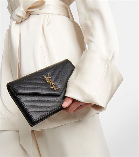 Cassandre Envelope leather wallet on chain in black 